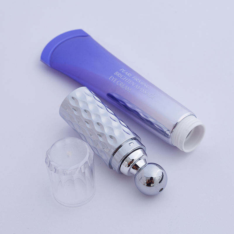 eye cream tube with vibrating metal massage applicator eye cream tube with vibrating metal massage applicator