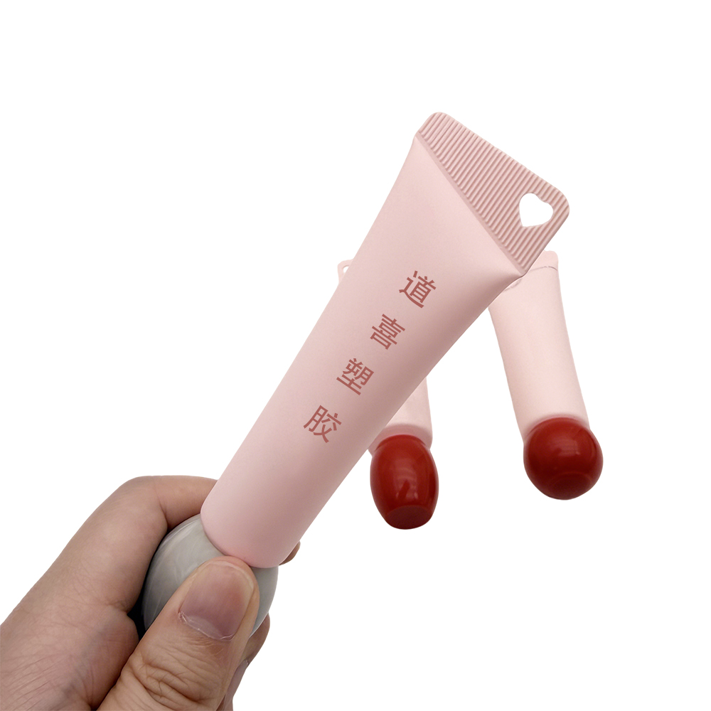 Cosmetic tube with heart hole Cosmetic tube with heart hole