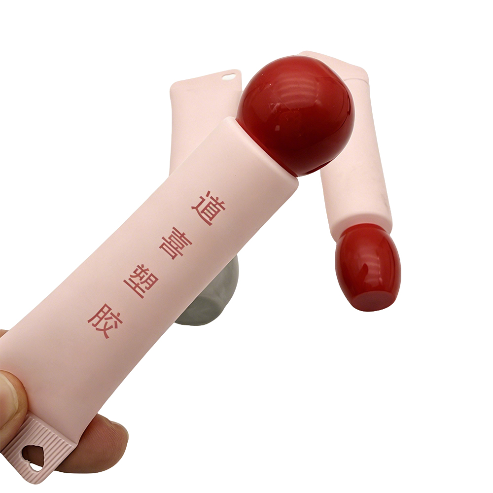 Cosmetic tube with heart hole Cosmetic tube with heart hole