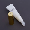Gloss Gold Plating White Squeeze Soft Tube Packaging Eye Cream Massage Tube with Silicone Head