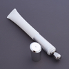 Custom Eye Cream Lotion Cosmetics Plastic Round Shaped Metal Applicator Massage Metal Head Eye Cream Packaging Tube