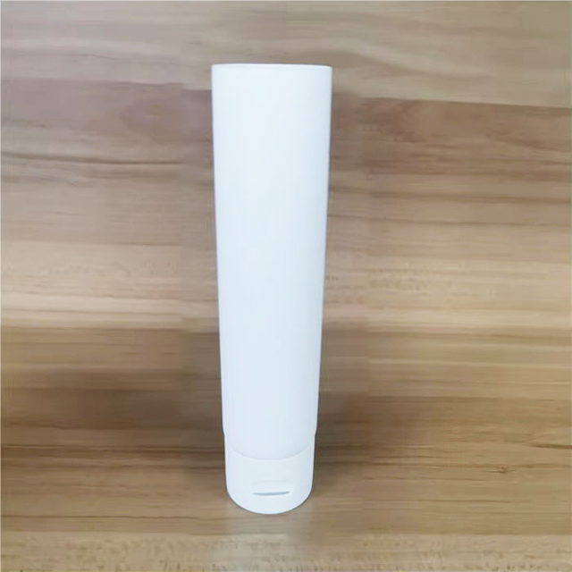 China Factory Empty Round Tail Open Unsealed Flip Top White Glossy Cosmetic Face Wash Facial Cleanser Soft Squeeze Tube