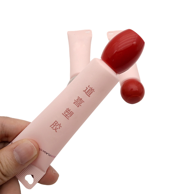 Custom 15ml Cosmetic Soft Squeeze Tube with Heart Shaped Hole Tail Ball Cap Lip Gloss Cosmetic Tube Packaging